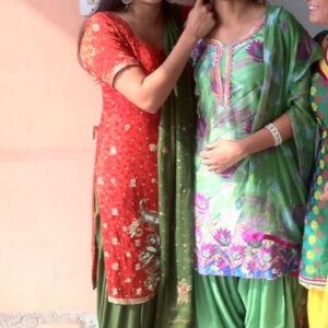 Orange and green suit size small